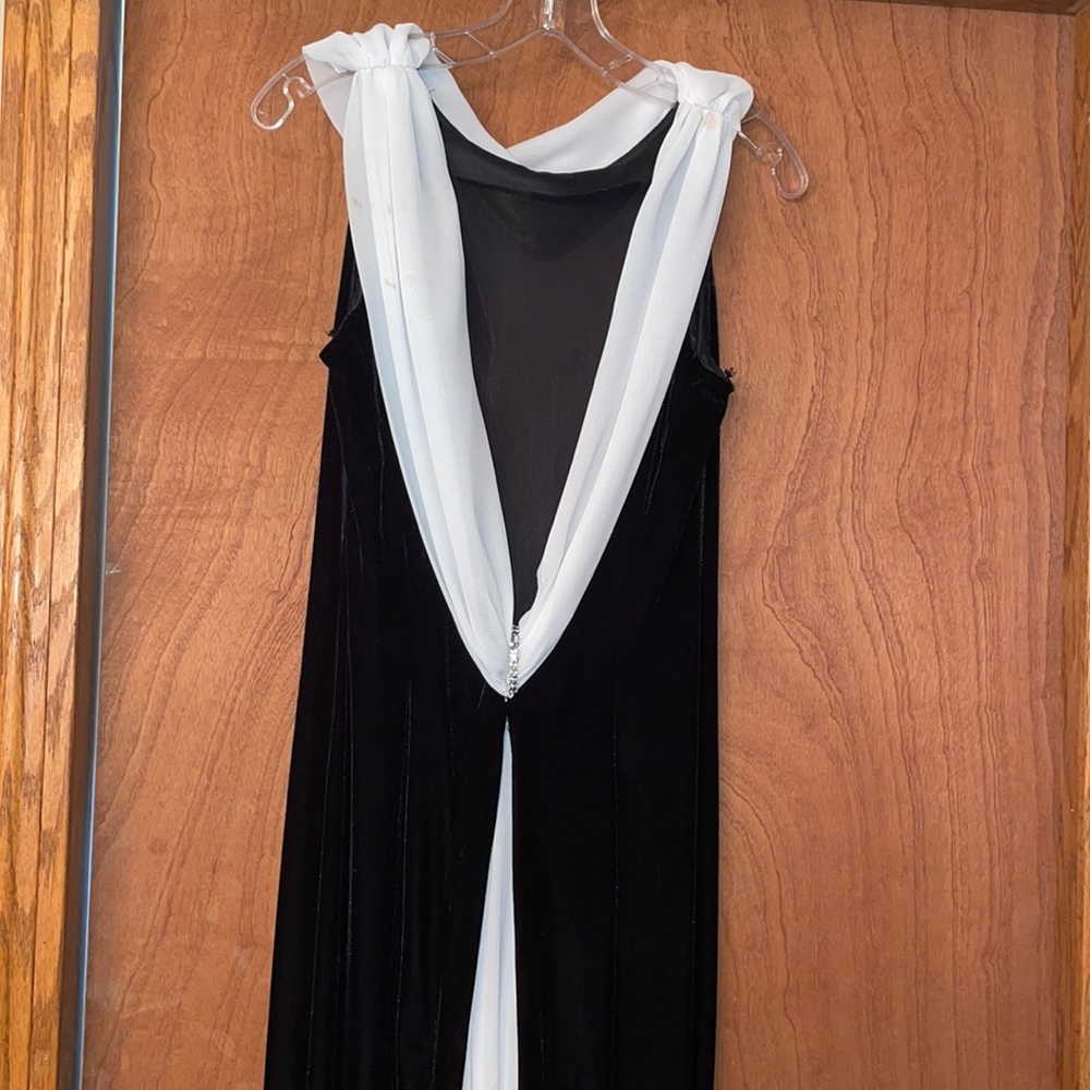 Elegant black tie evening gown.